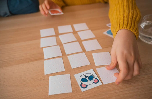 person using flashcards