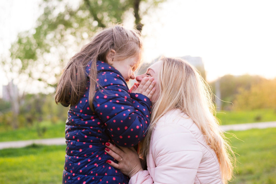 mother and daughter enbracing