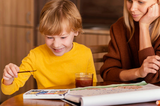Child learning German with books 